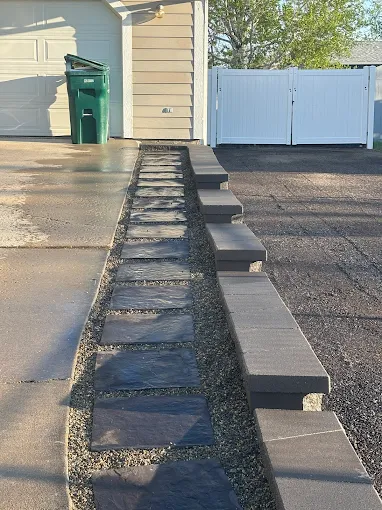 Slate stone walkway and concrete steps installation