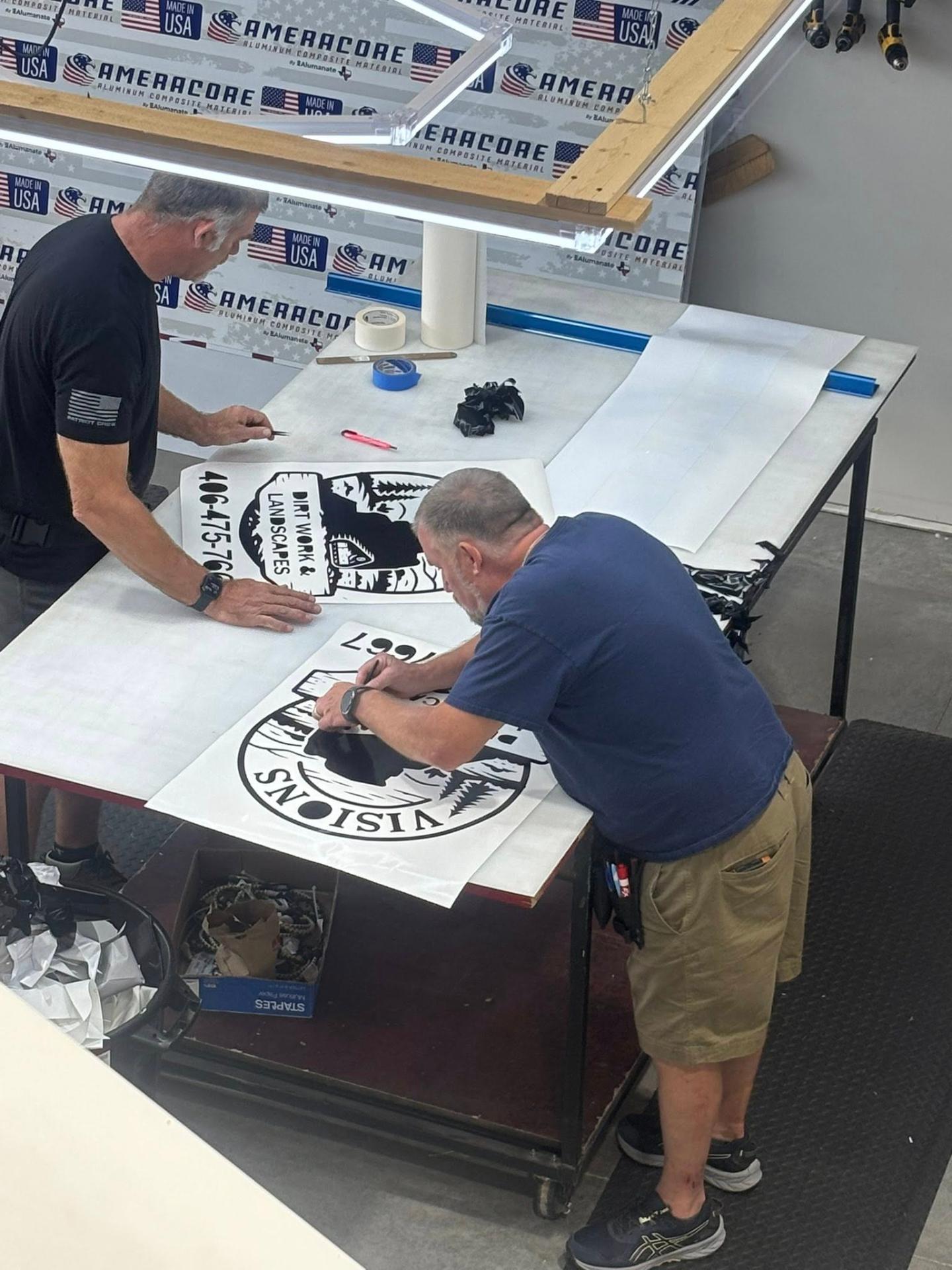 Visions crew applying custom branded decals — Made in USA craftsmanship